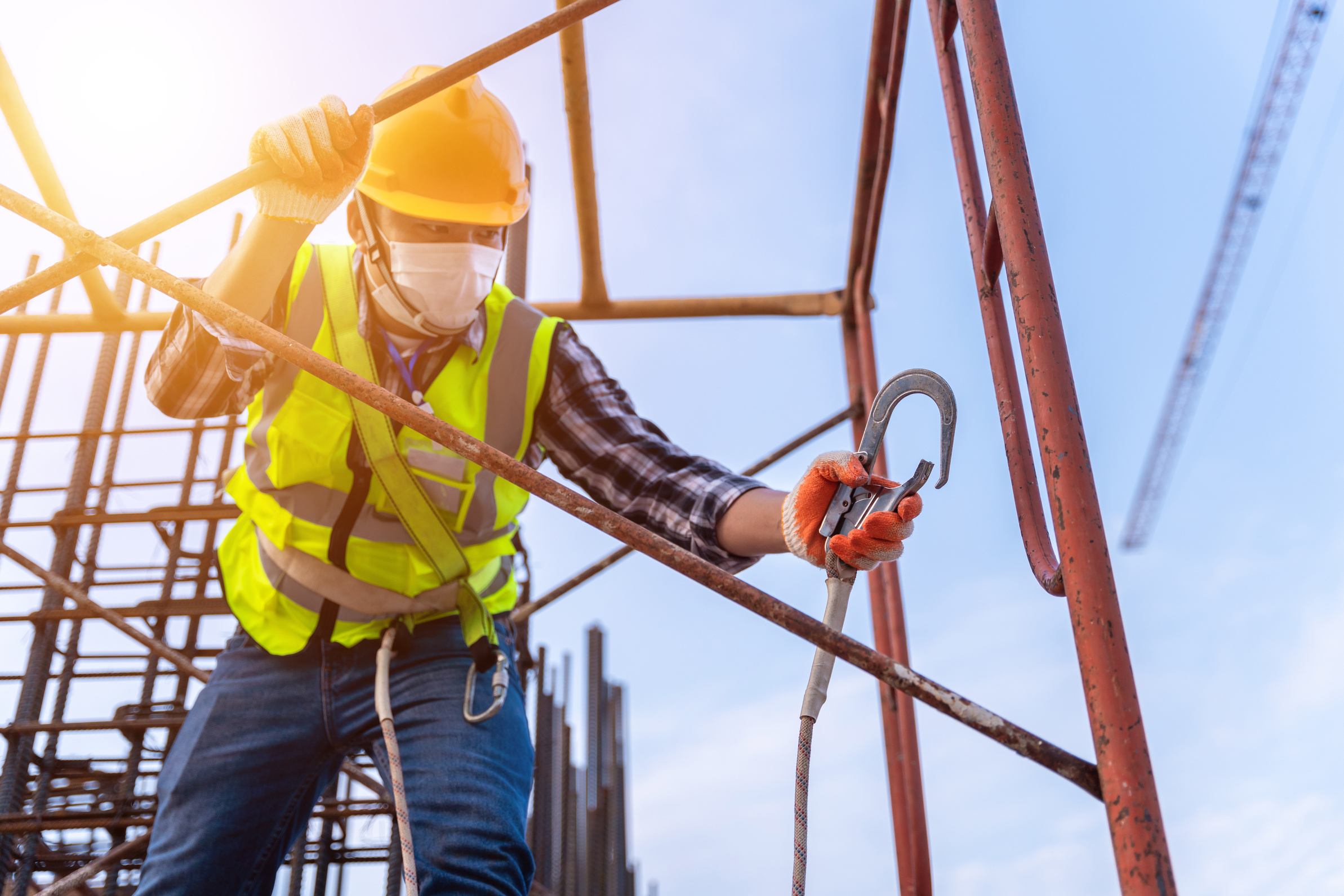 Worker working at height equipment constructive at construct